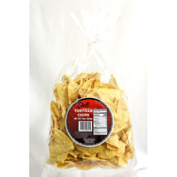 Clear plastic bag with a red and black label showing 'Tortilla Chips' and nutritional information.