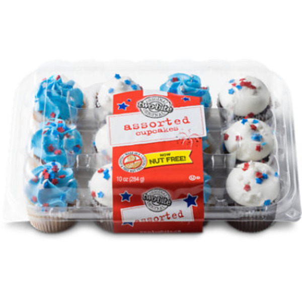 Original Two-Bite Assorted Chocolate And Vanilla Flavored Mini Cupcakes With Sweet Icing.
